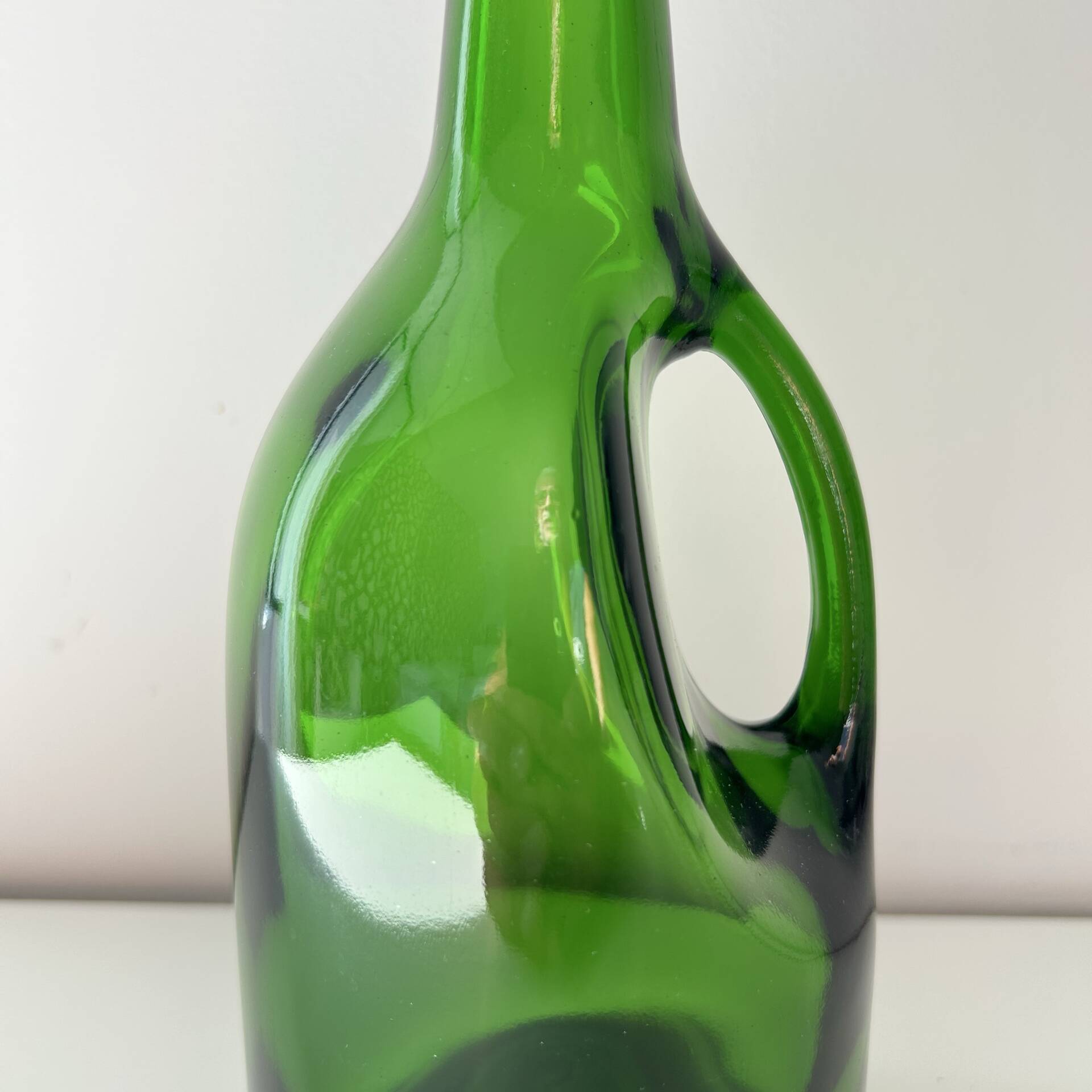 Green glass bottle
