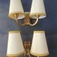 Pair of bronze wall sconces with 1940s Art Deco lampshades.