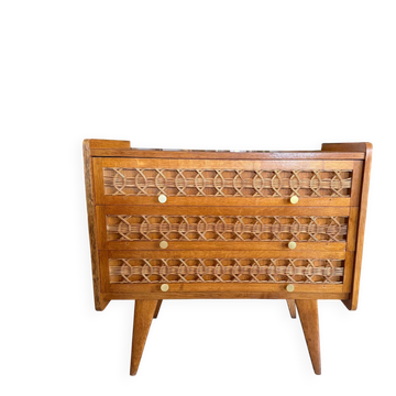 Vintage wooden and rattan chest of drawers with tapered legs.