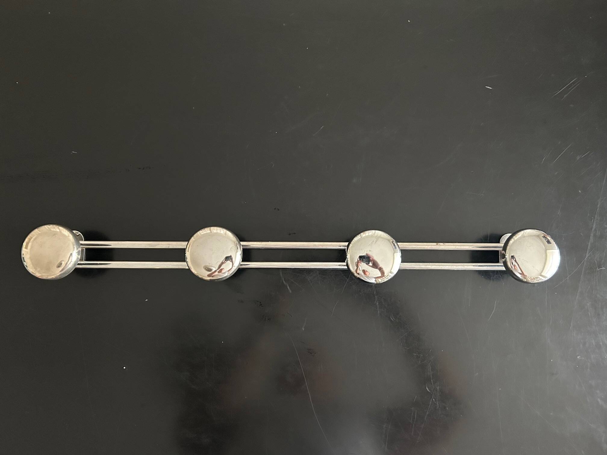 old chrome metal coat rack