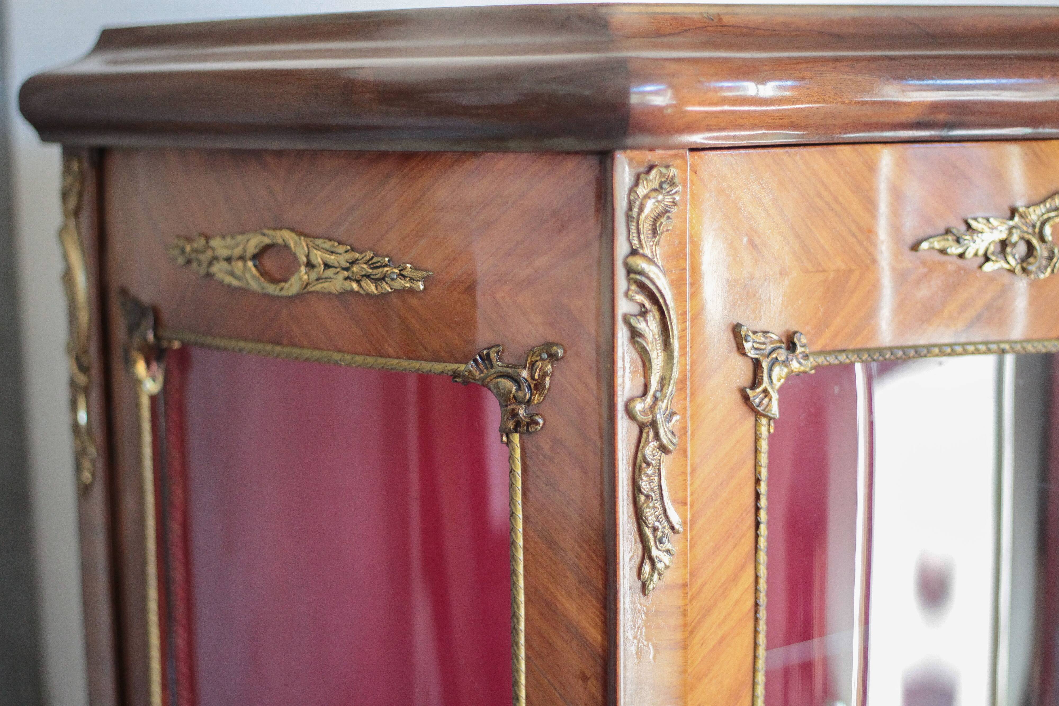 Marquetry display cabinet, curved Louis XV style, signed Marquant