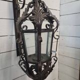 Patinated iron wall lantern