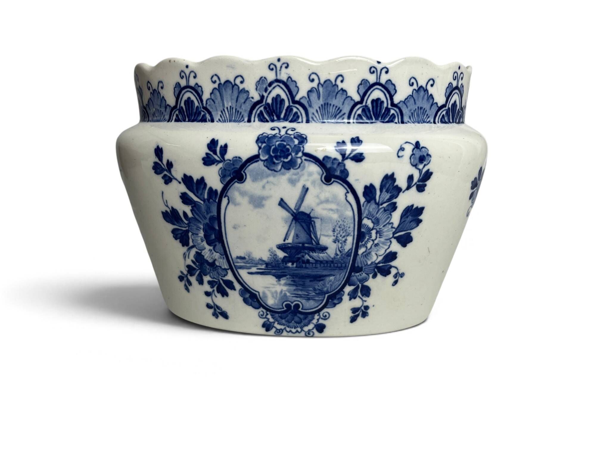Delft, decorative pot planter with boat and windmill design from the early 20th century.