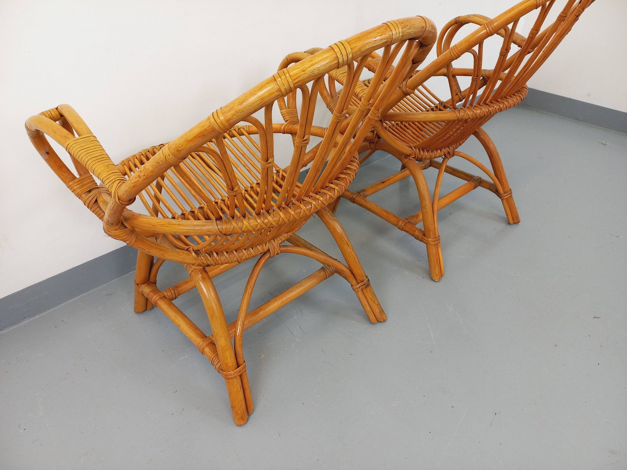 Pair of vintage rattan armchairs from the 60s