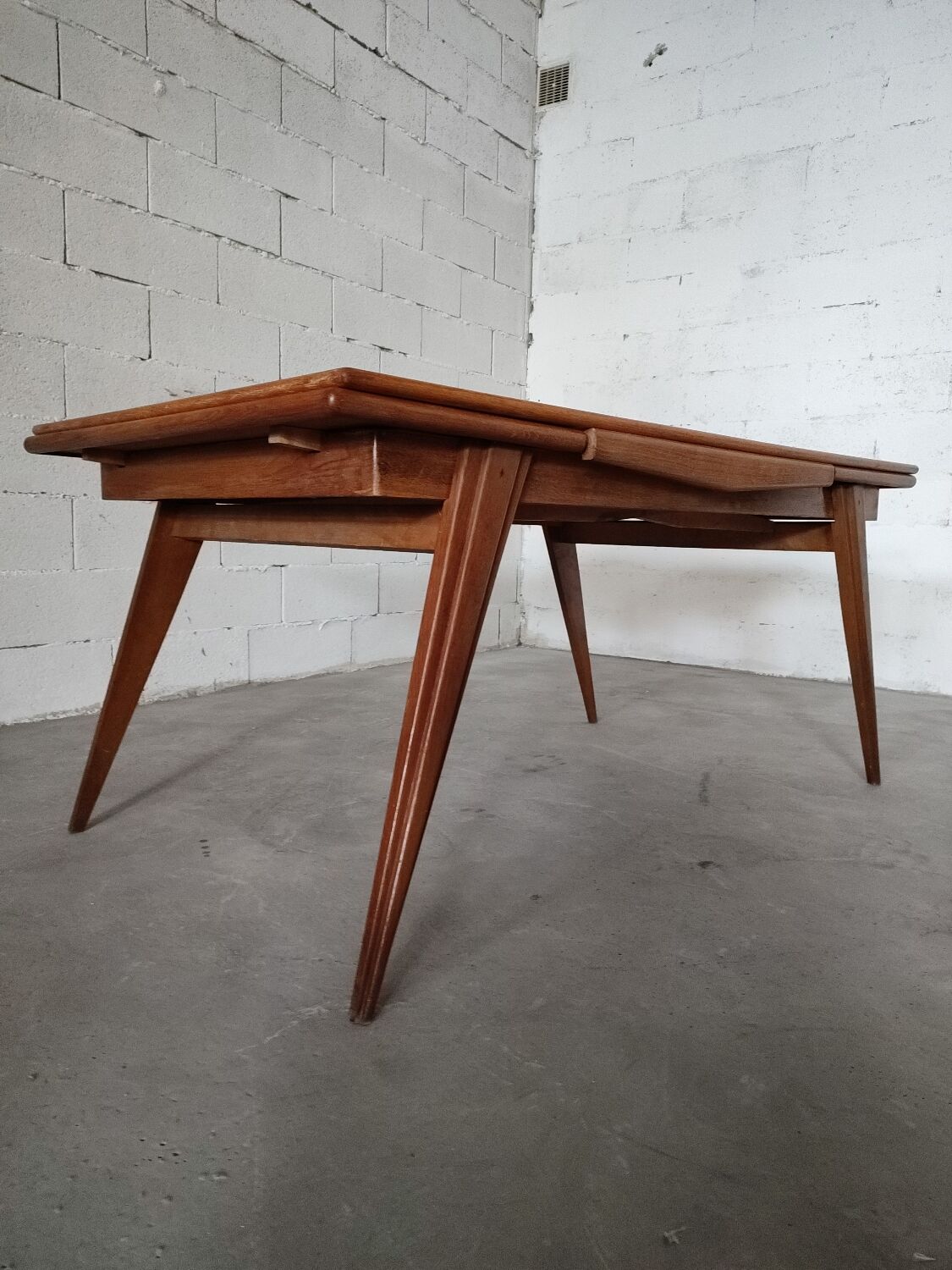 Vintage compass foot dining table