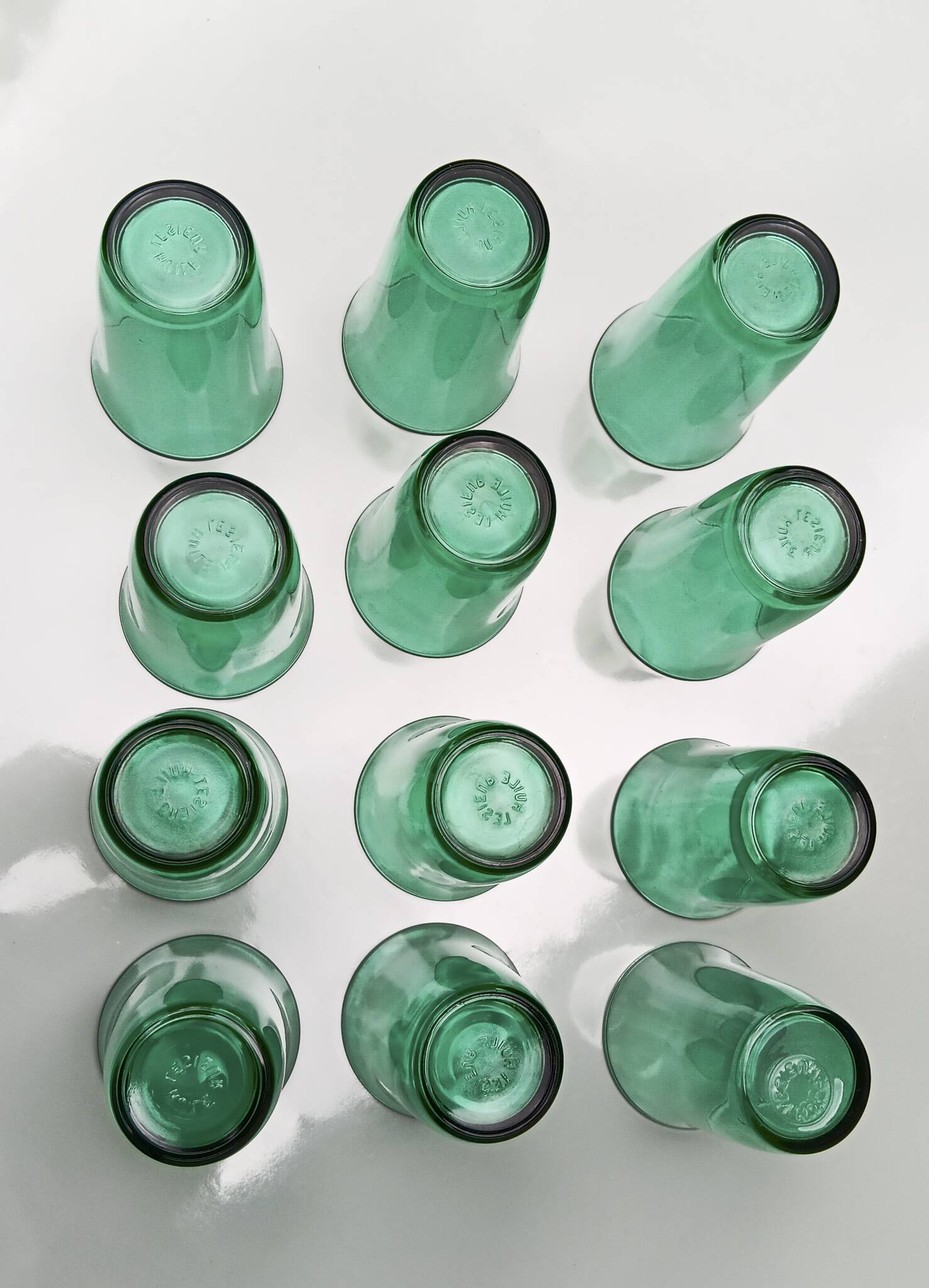 12 vintage Lesieur green glasses.