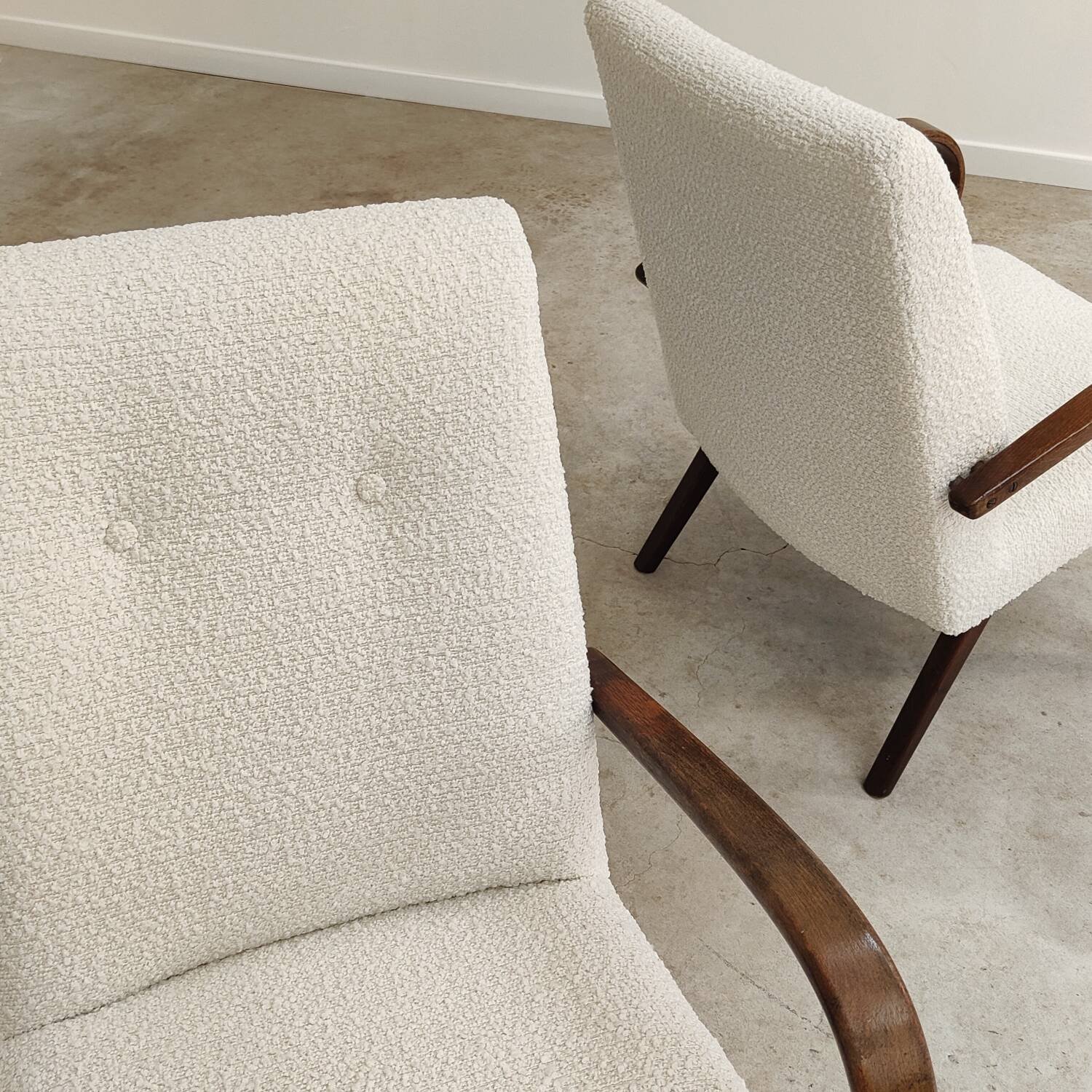 Pair of Jaroslav Smidek armchairs for Ton Bystrice, restored with white boucle, 1960.