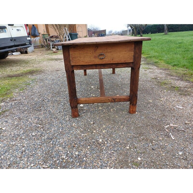 19th century country farmhouse table in walnut and pine, with 3 drawers