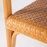 Paire de fauteuils en rotin et cuir tressé