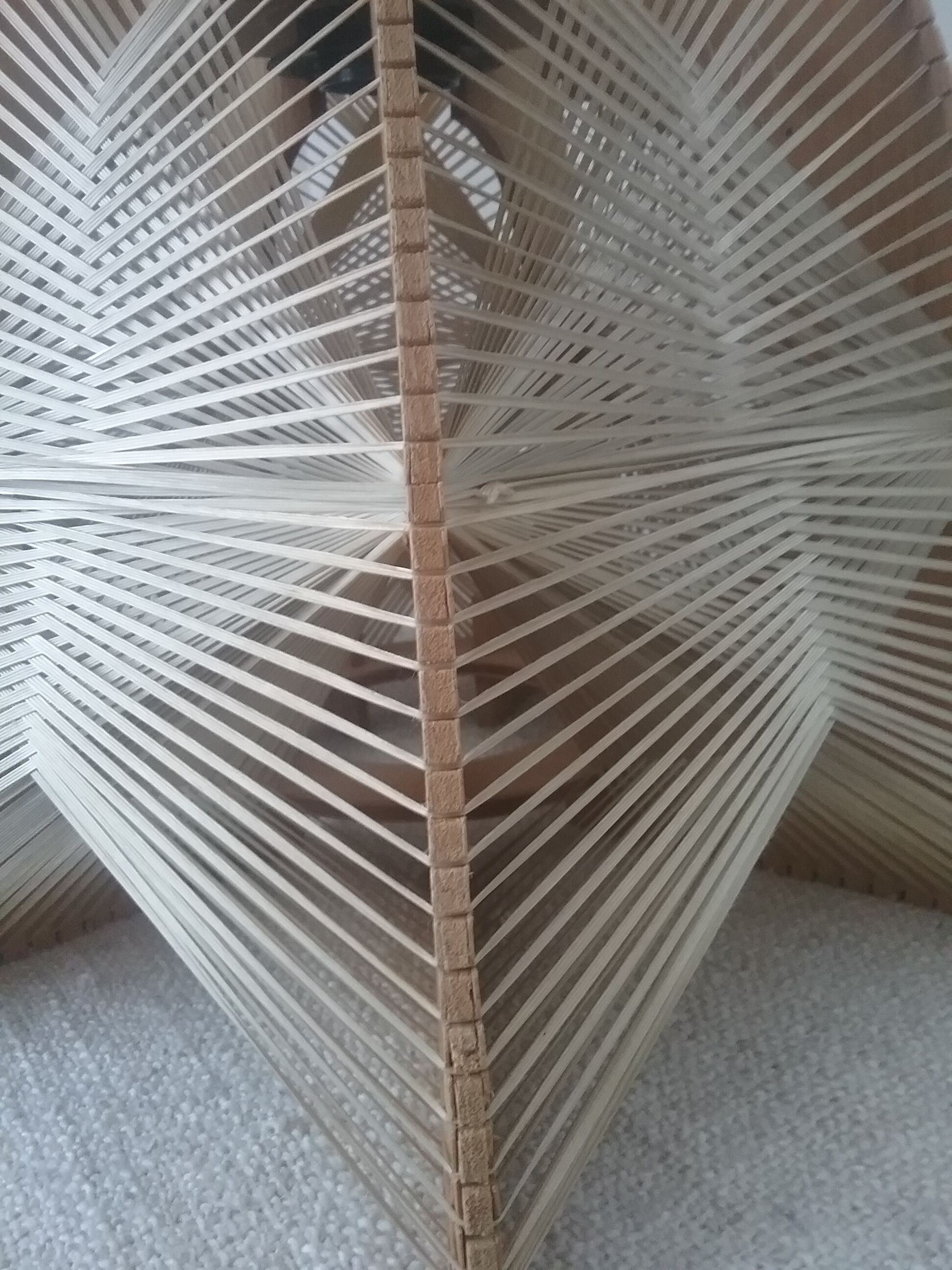 Hanging lamp of wood and thread Scandinavian style