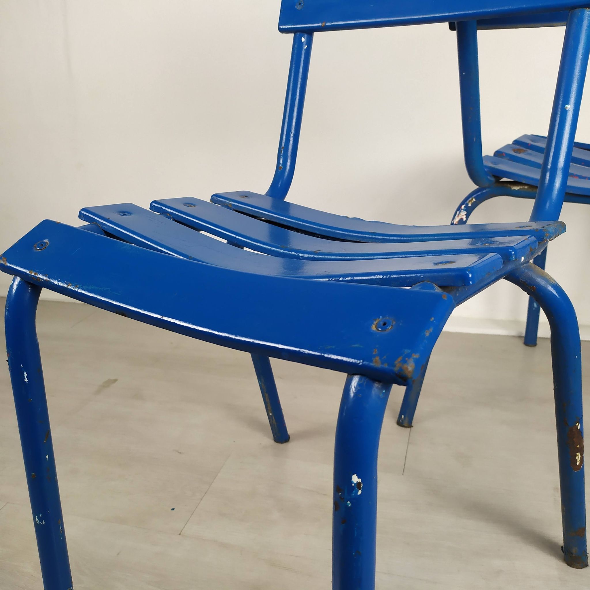 14 blue metal bistro chairs