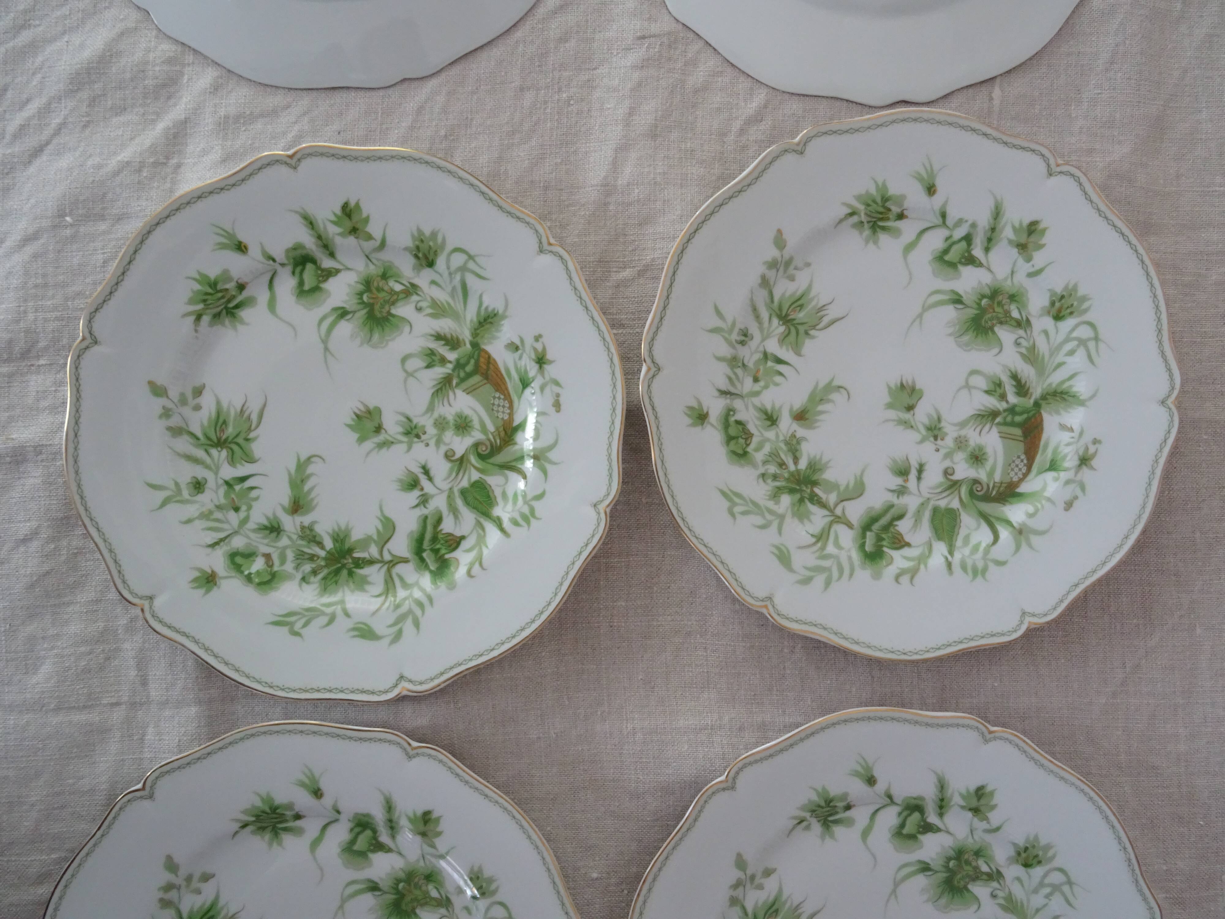 6 flat plates and 1 round dish haviland limoges with green and gold horn