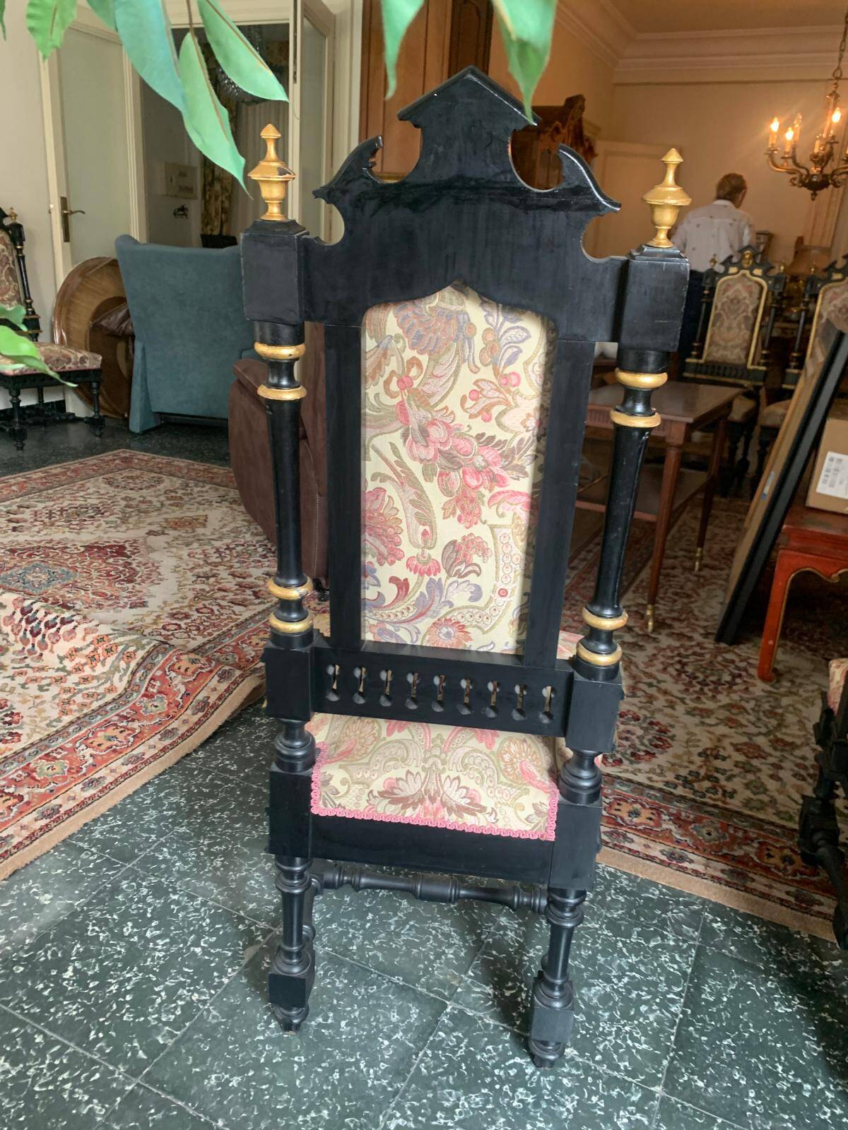 Historicist chair in ebonised and gilded wood