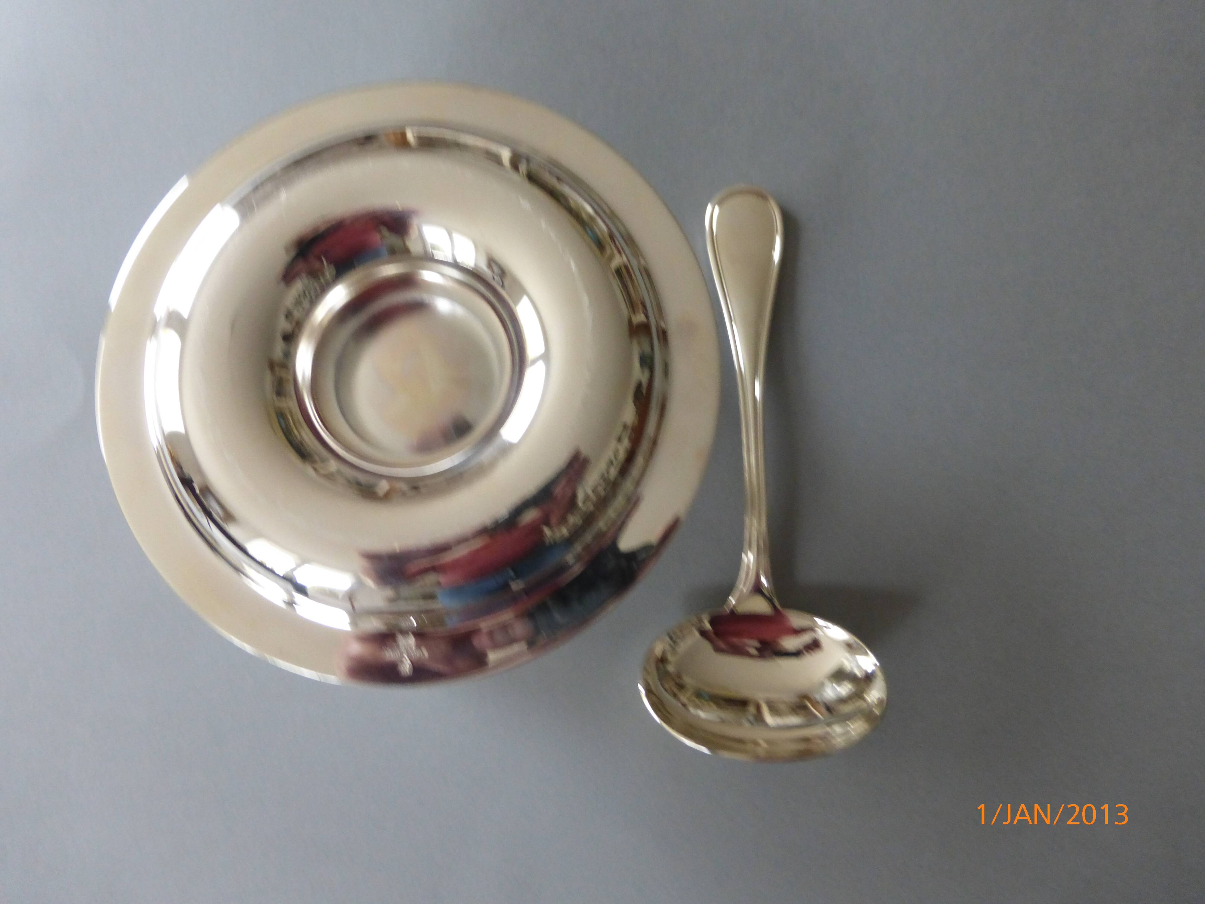 Sauce boat and serving spoon