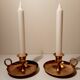 Pair of brass hand candlesticks