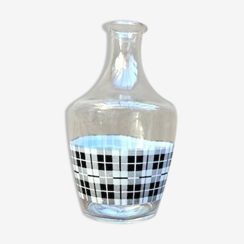 Vintage decanter with black and white tiles