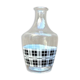 Vintage decanter with black and white tiles