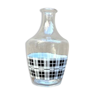 Vintage decanter with black and white tiles