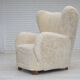 1960s, Danish design, reupholstered highback armchair, genuine sheepskin.
