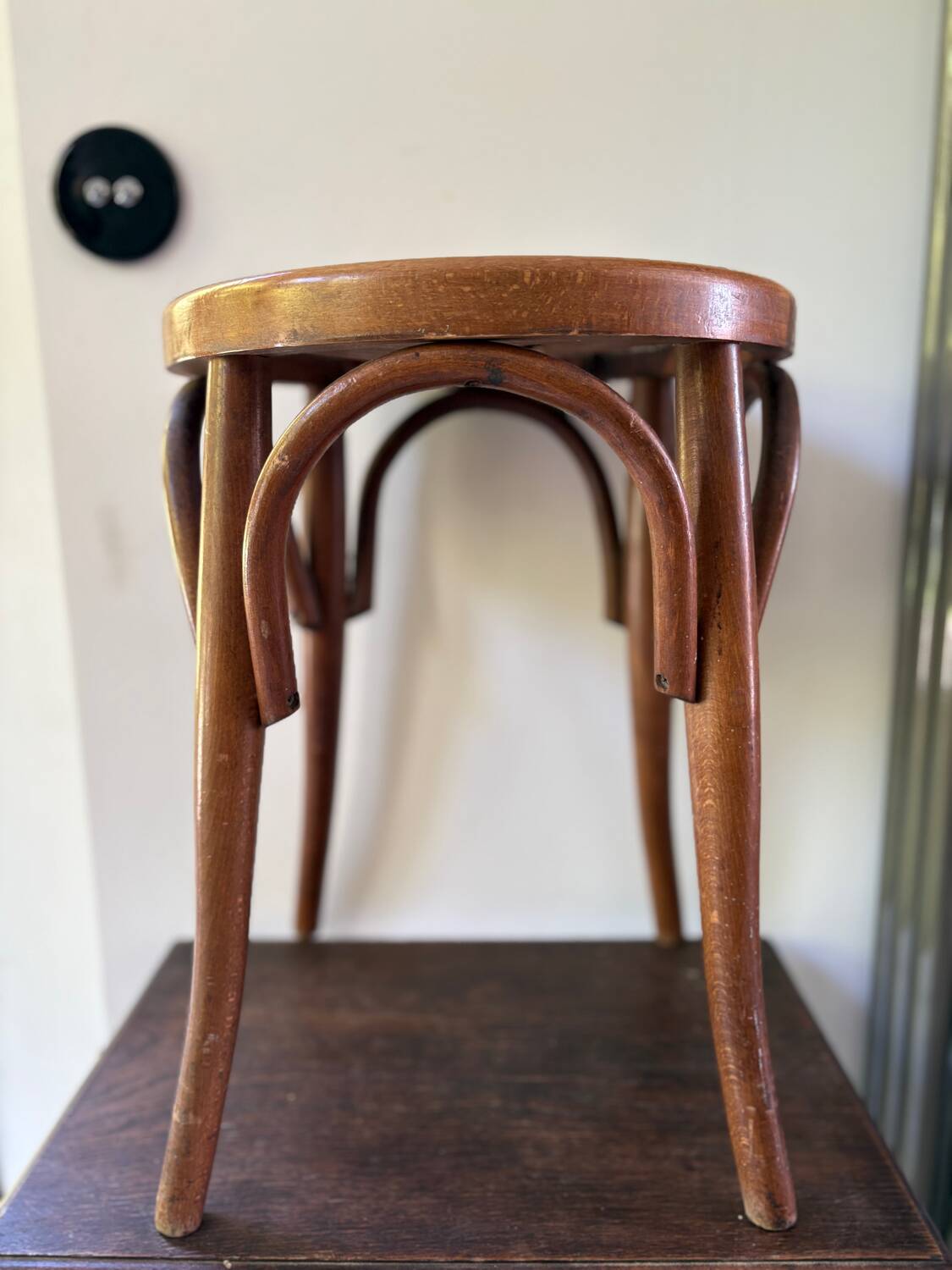 Thonet low stool in vintage wood