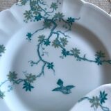 12 Haviland Limoges dessert plates.