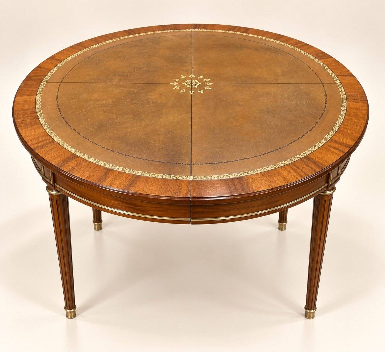 Extendable dining table – Louis XVI style – Mahogany, leather, brass