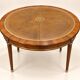 Extendable dining table – Louis XVI style – Mahogany, leather, brass