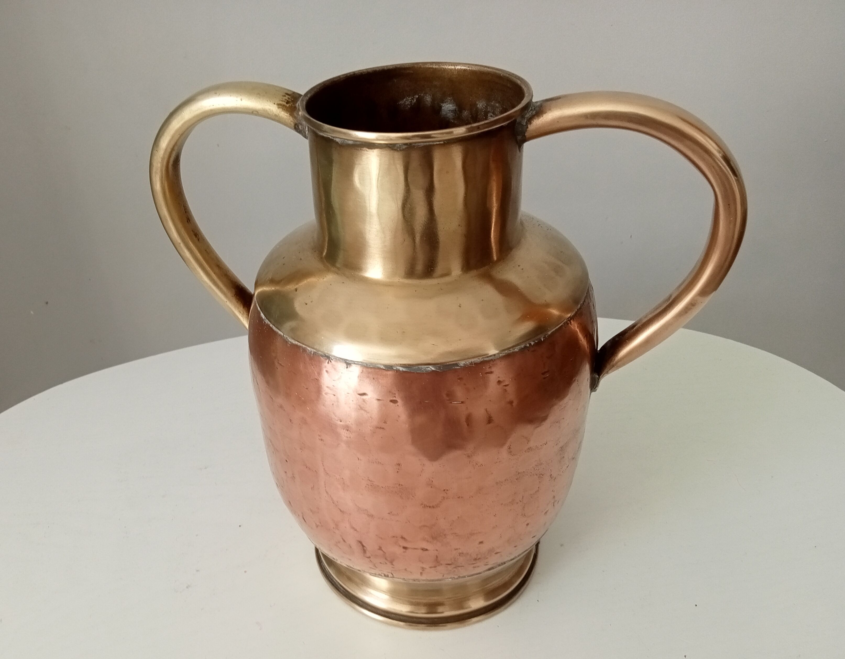 Antique amphora vase in brass and copper