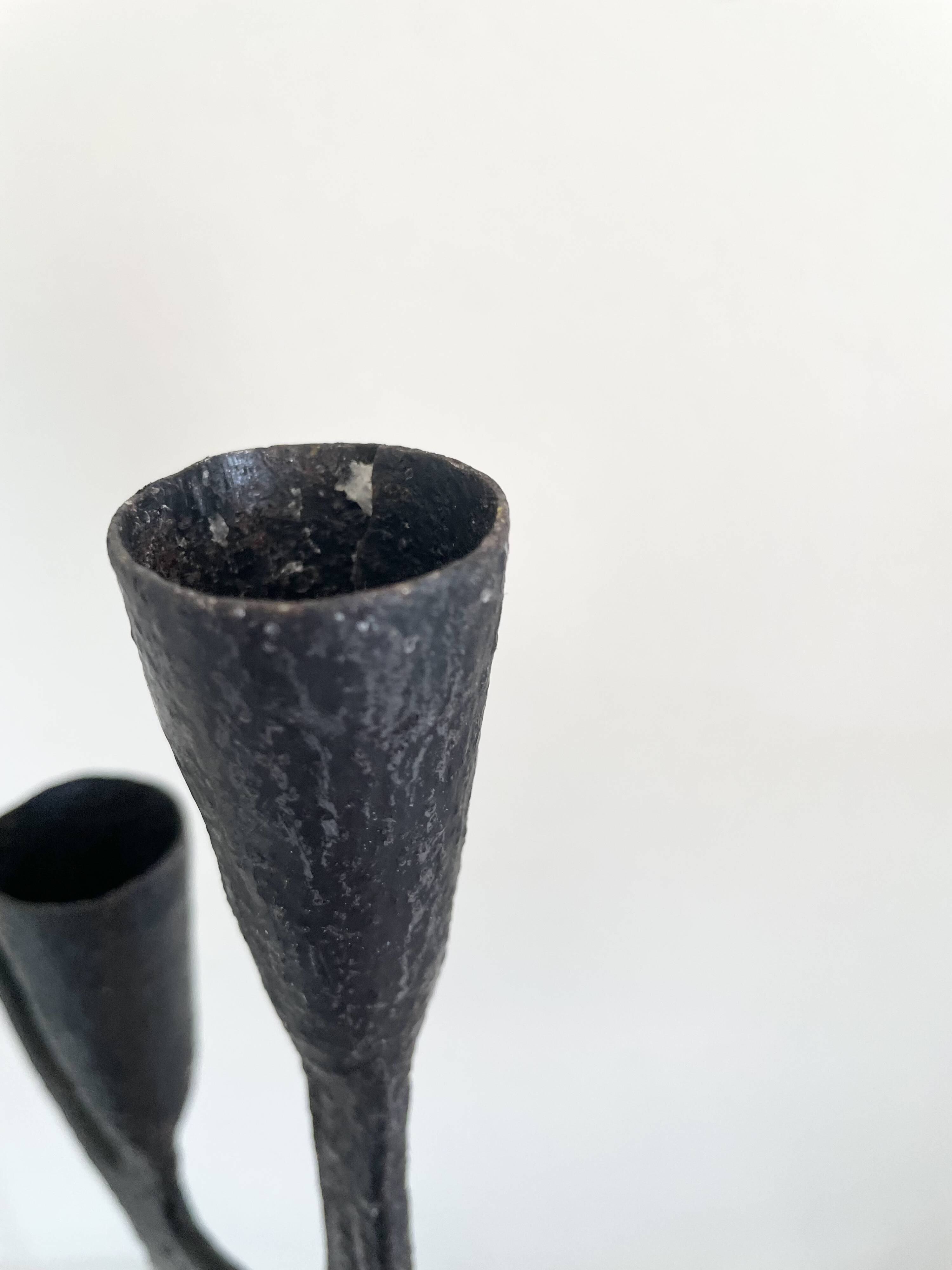 Wrought iron candlesticks