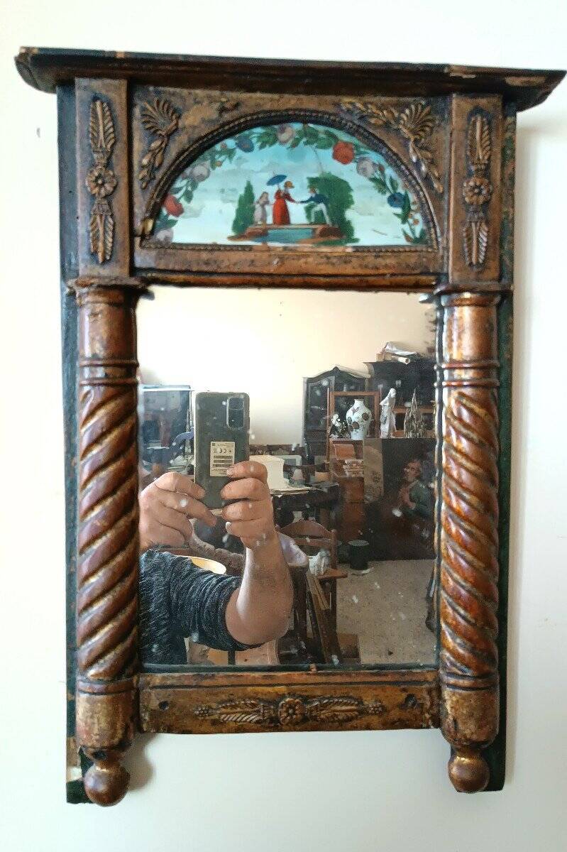 Small antique Empire mirror in gilded wood painted on glass