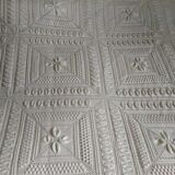 Knitted white cotton bedspread