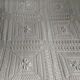 Knitted white cotton bedspread