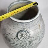 Stoneware vase signed by Sylvie Dufour, incised decoration and relief medallions, 28 cm.