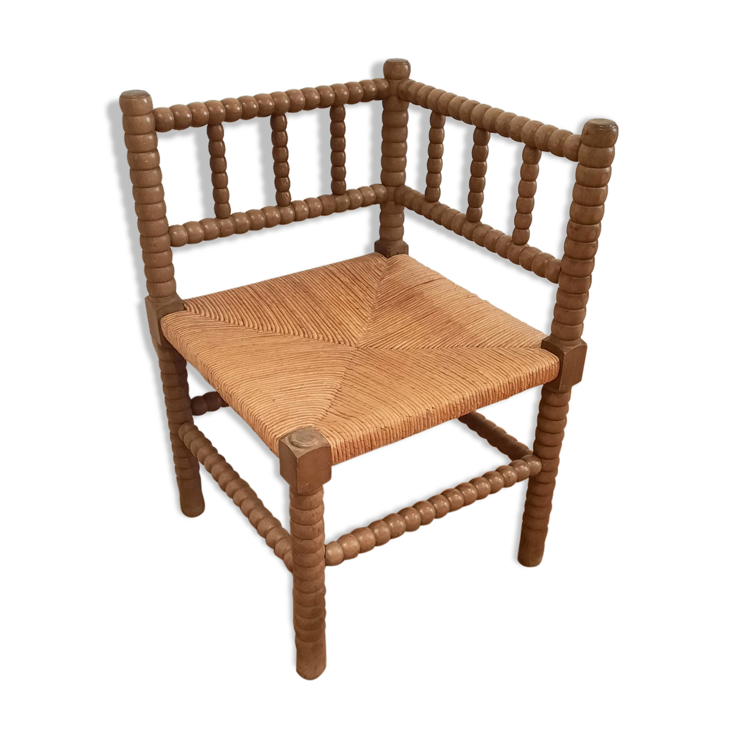 Turned wooden corner chair