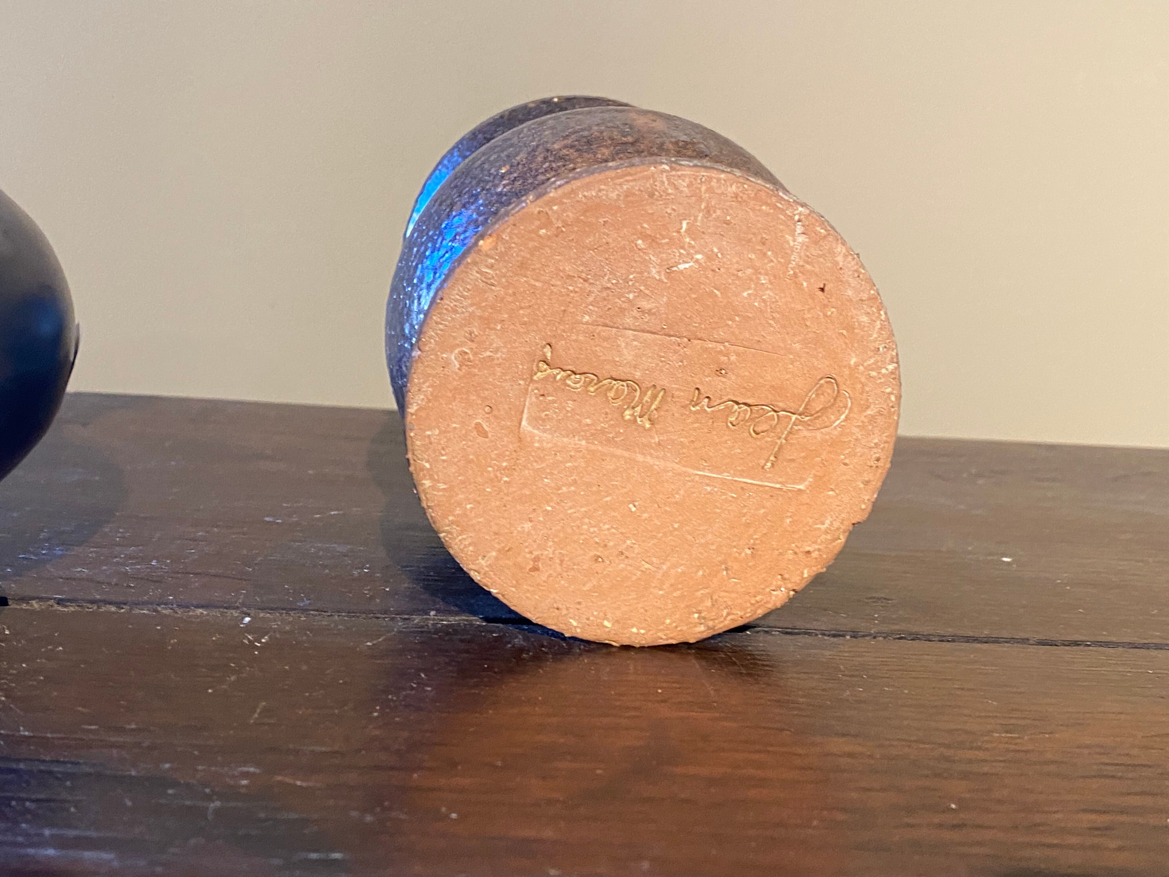 Set of 2 Jean Marais ceramic pitchers