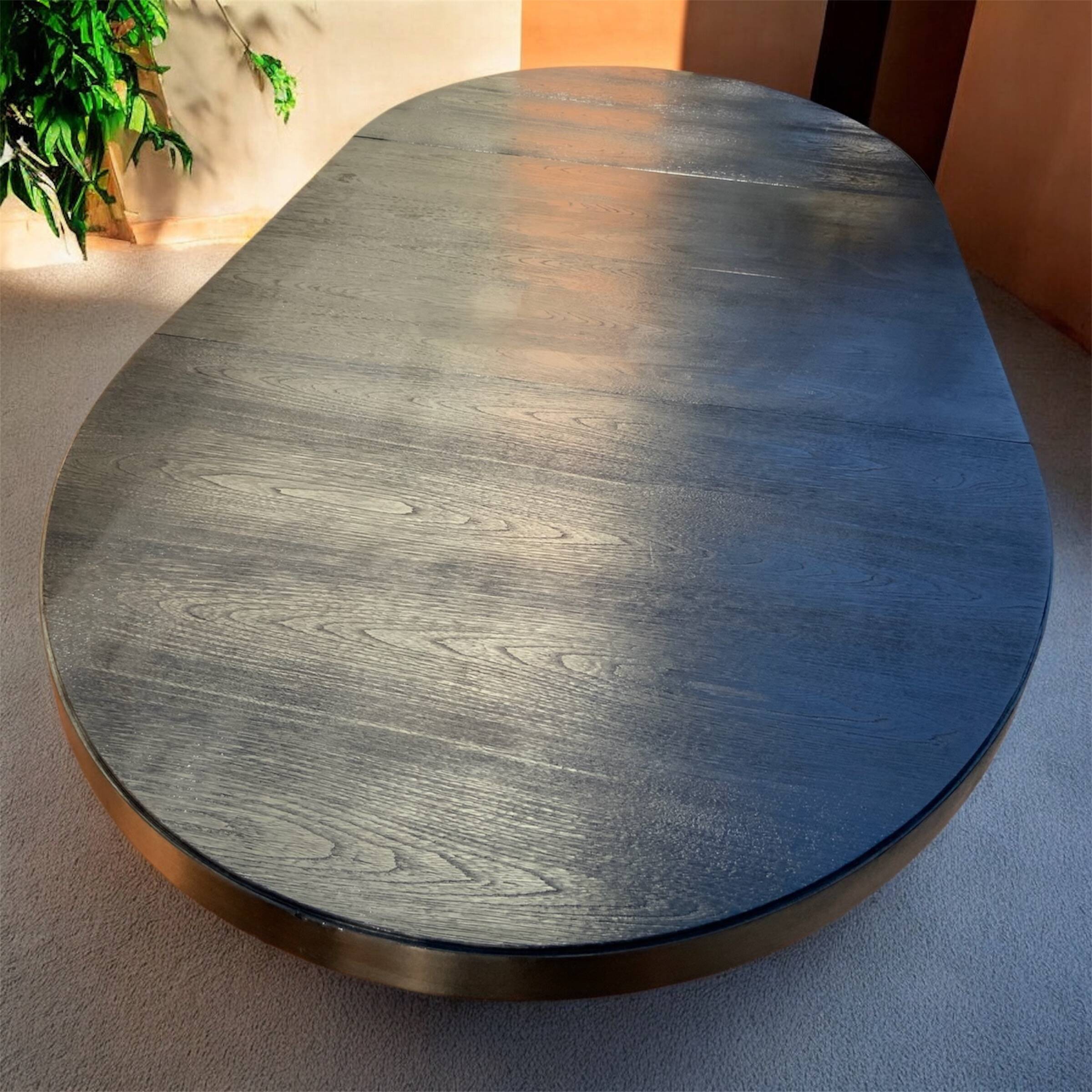 Oval extendable dining table in the style of baumann — ebonised black — vi