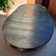 Oval extendable dining table in the style of baumann — ebonised black — vi