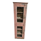 Pink showcase in Burmese teak
