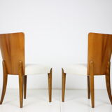 Ensemble de quatre chaises à manger restaurées modèle H-214 conçu par Jindřich Halabala, années 1950.