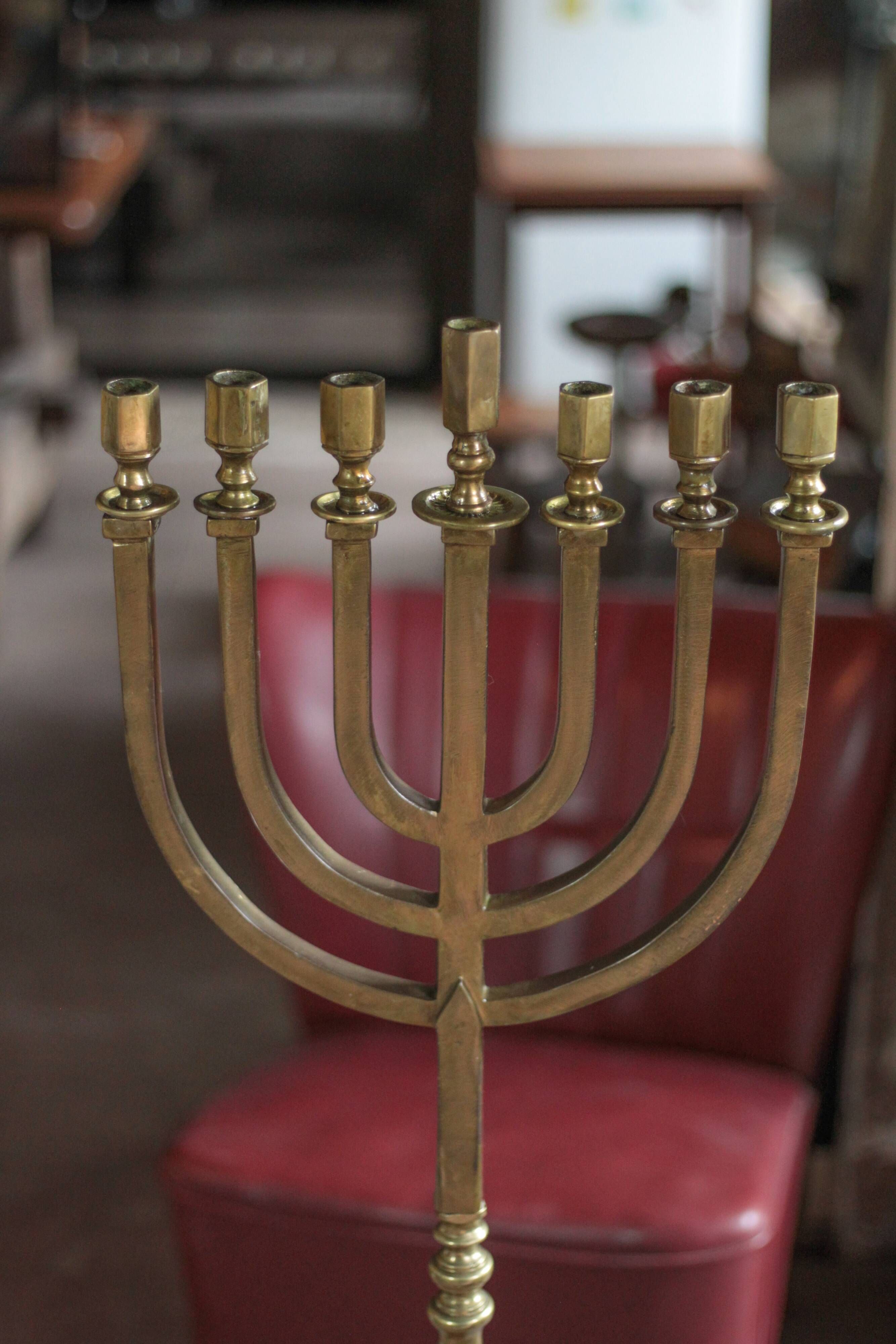 Golden bronze chandelier with seven arms, Menorah, candlestick on a stand, candelabrum.