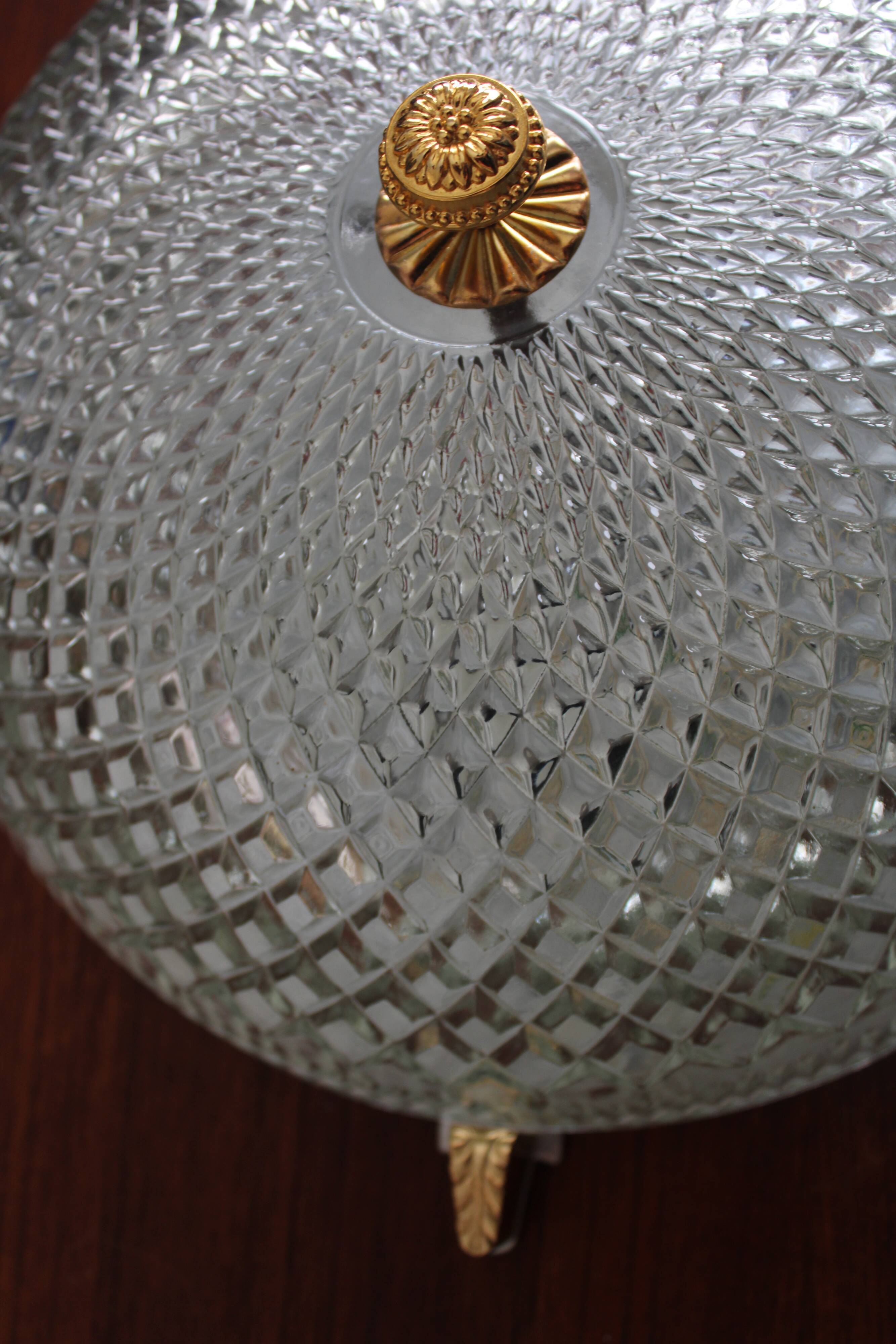 Brass ceiling light with moulded glass