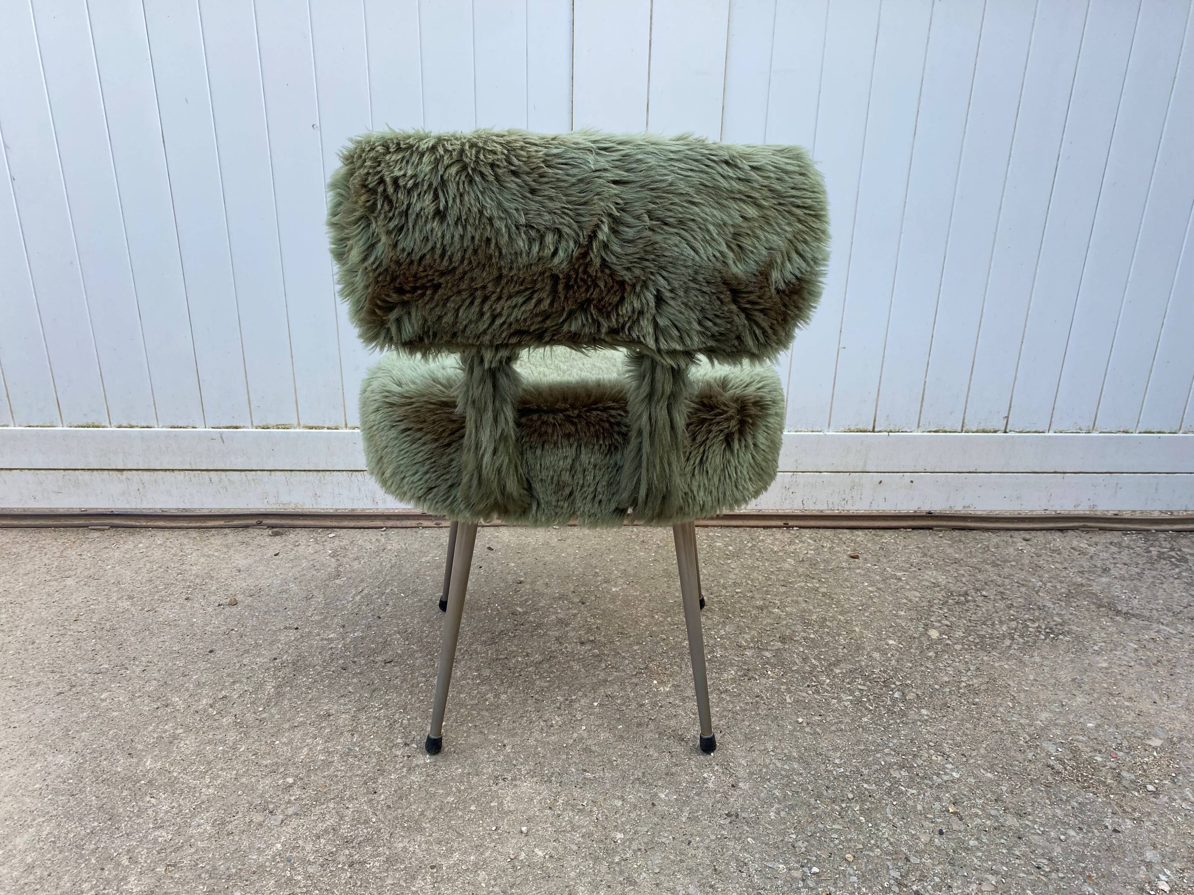 Vintage green furry chair from the 1960s