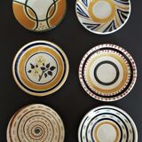Set of six flat plates in earthenware XXth
