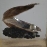 1970 Table lighter with pearl oyster in resin inclusion
