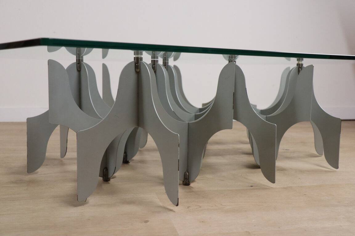 Minimalist sculptural coffee table in metal and glass