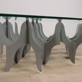 Minimalist sculptural coffee table in metal and glass