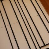 String shelf in wood and black metal