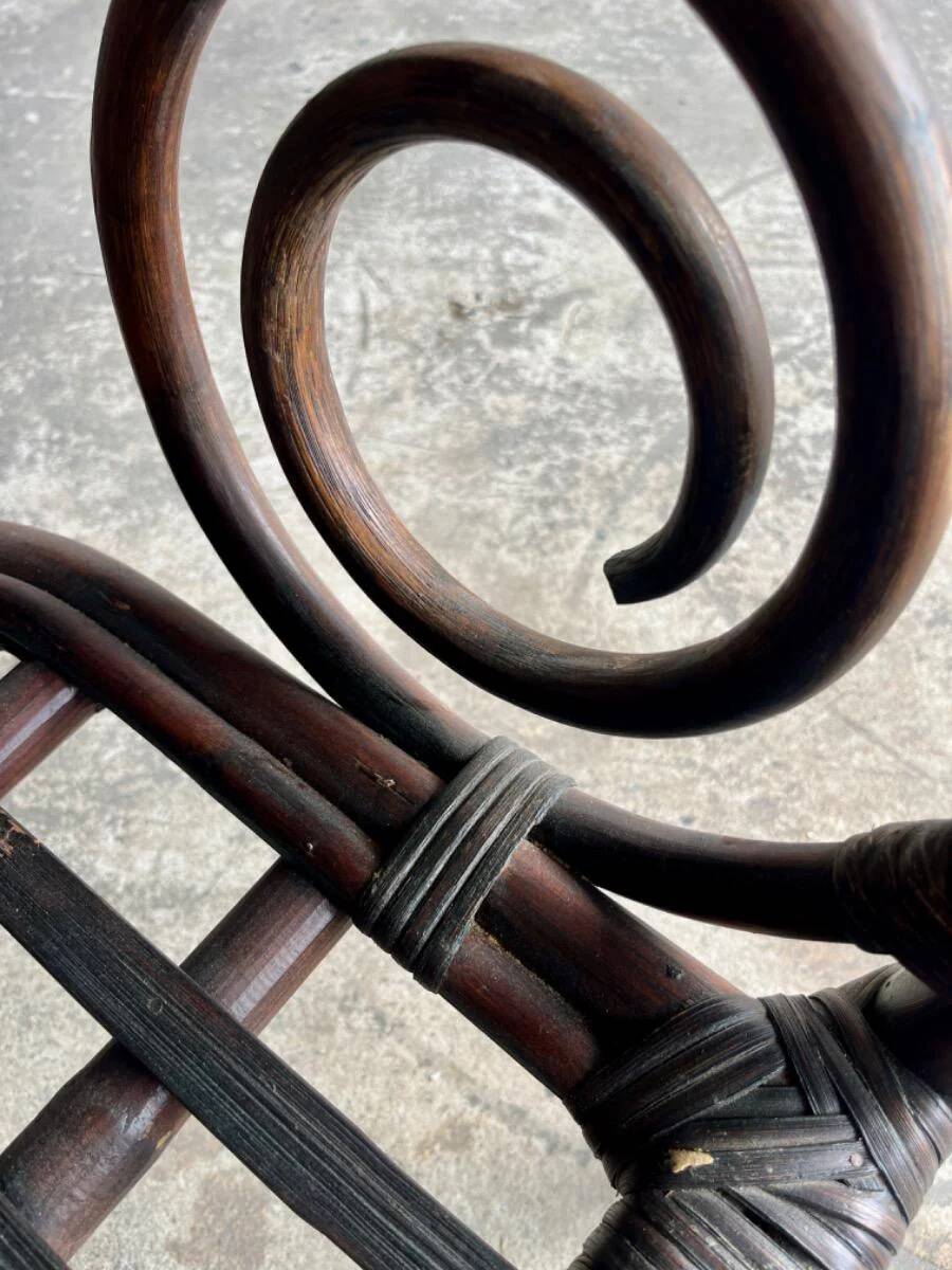 Mid-century Manou dark brown bamboo armchair with open rattan backrest, 1960s French