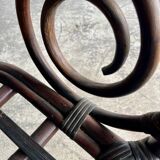 Mid-century Manou dark brown bamboo armchair with open rattan backrest, 1960s French