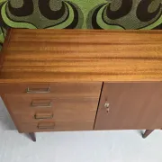 Small vintage sideboard from the 1960s with 4 drawers and a door.